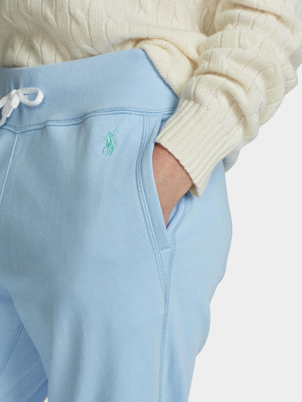 Light blue sports trousers with logo embroidery - 3
