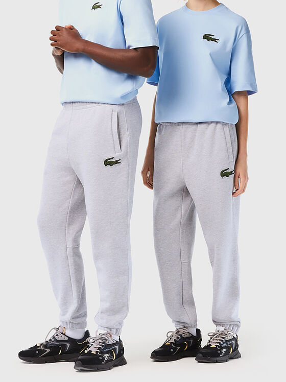 Sports trousers with accent logo  - 1