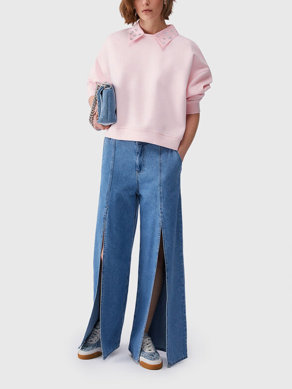 Flared jeans with slits - 4