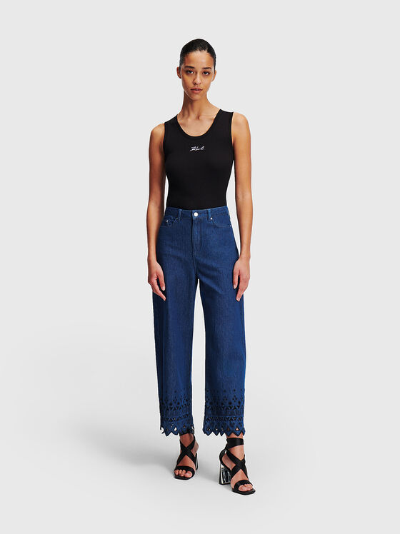 Jeans with perforations and embroidered details - 1