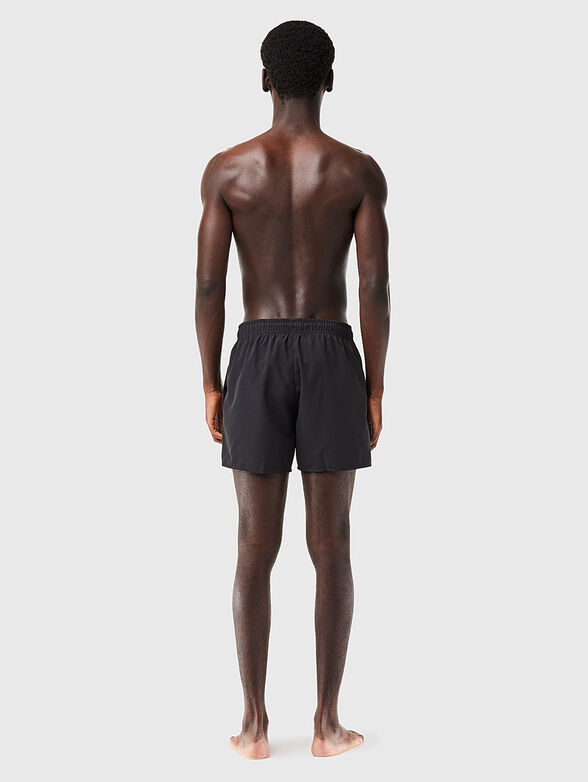 Yellow shorts with logo detail - 2