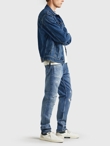 Blue jeans with ripped details - 5