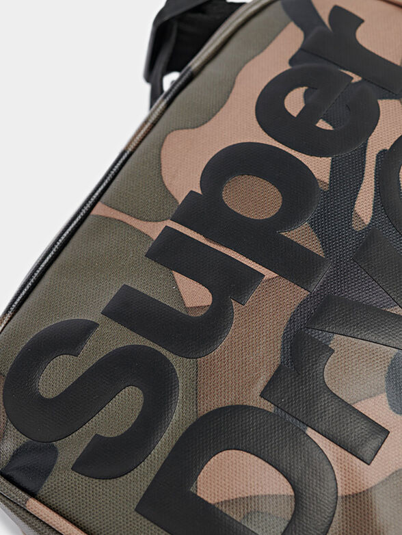 Crossbody bag with embossed logo accent - 5