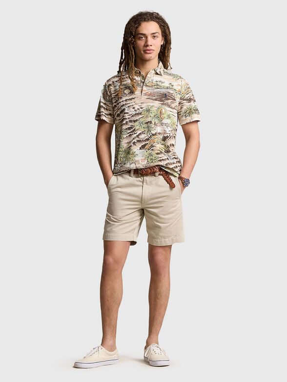 Polo shirt with tropical print - 1