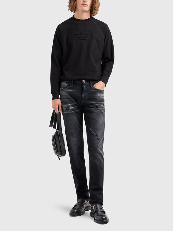 Black jeans with washed effect - 1