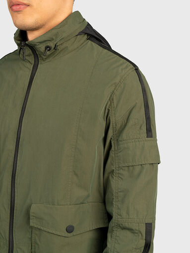 Green jacket with foldable hood - 3