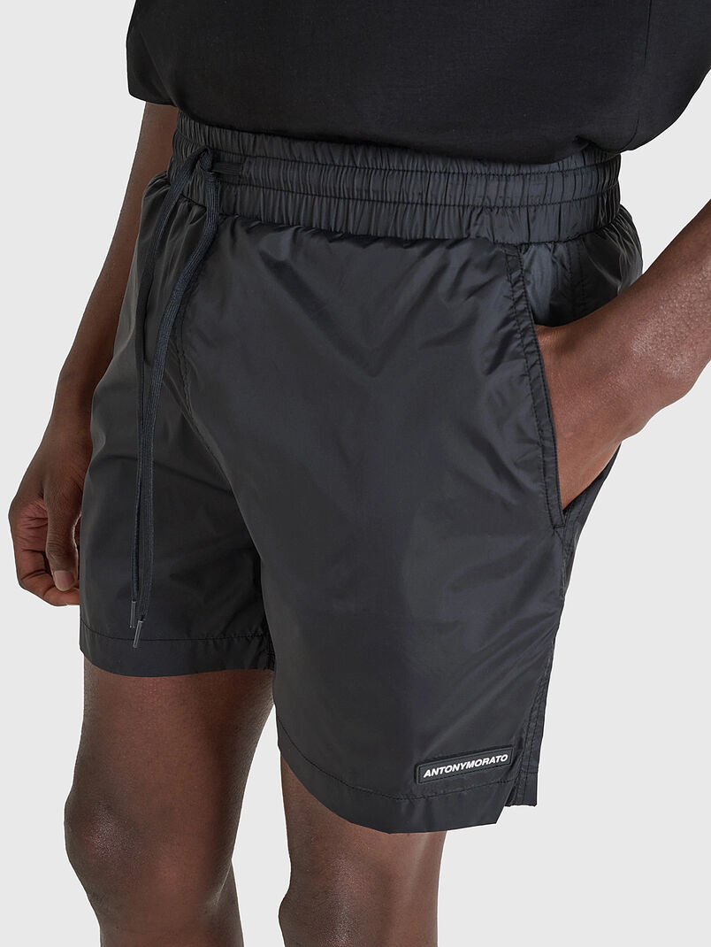 Beach shorts with rubberized logo - 3