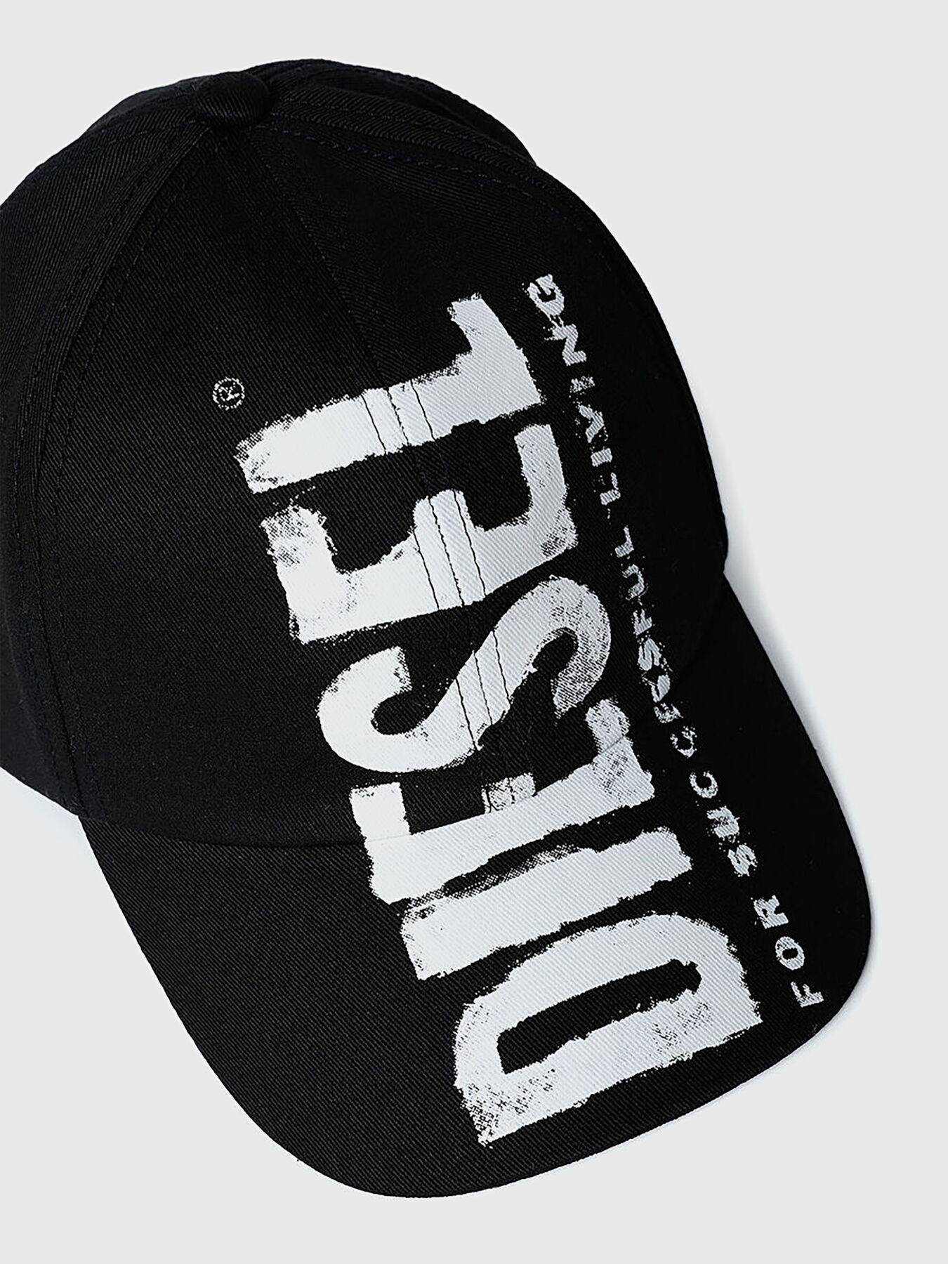 Logo print cap in black brand DIESEL — Globalbrandsstore.com/en