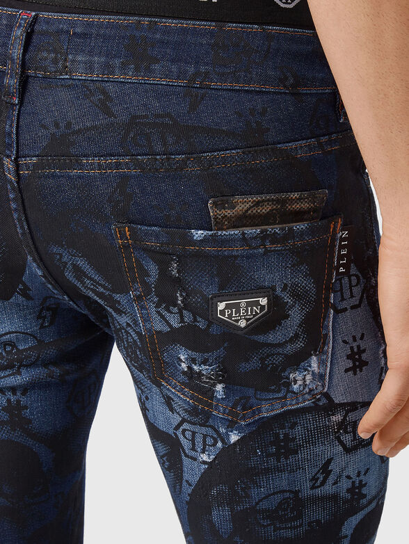 Jeans with washed effect and print - 3