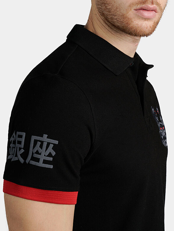 Black polo-shirt with contrasting embroideries - 4