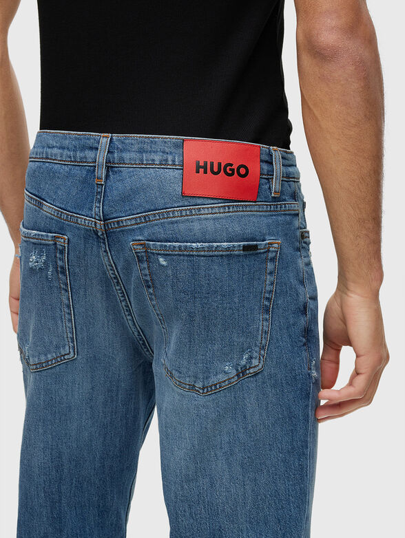 Blue jeans with distressed effect - 3