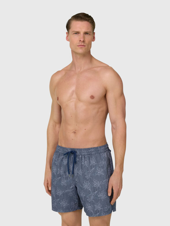 Beach shorts with floral motifs - 1