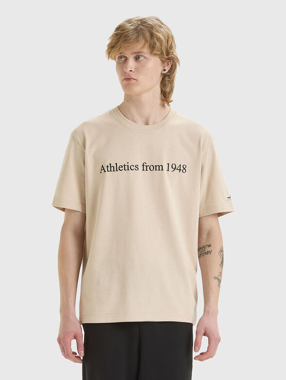 LEGACY unisex beige T-shirt with contrast inscription - 1