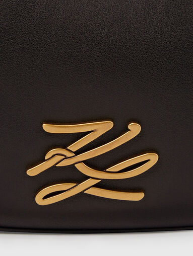 Black leather hobo bag with golden logo - 4