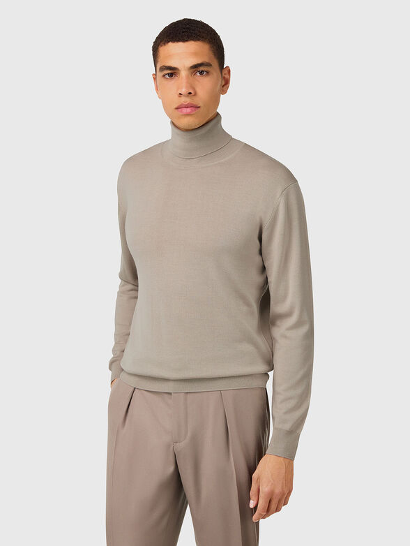 Wool sweater in beige color - 1