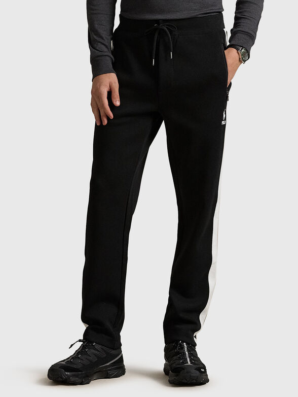 Sports pants with contrasting stripes - 1