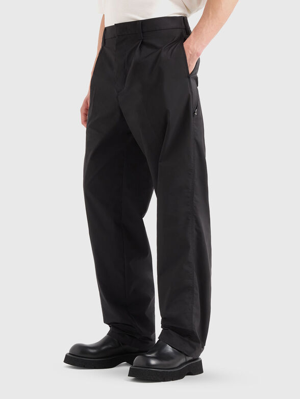 Trousers with zip pocket - 1