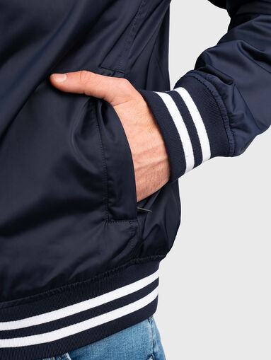 Blue jacket with zip and logo patch - 4