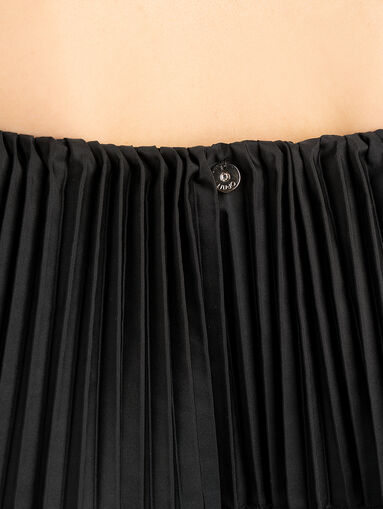 Black pleated top with ruffle - 4