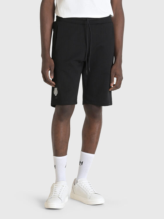 Sports shorts in black with logo detail - 1