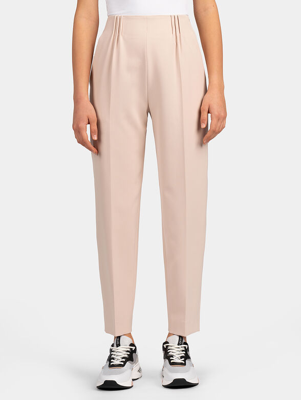 Pale pink trousers with crimped details - 1
