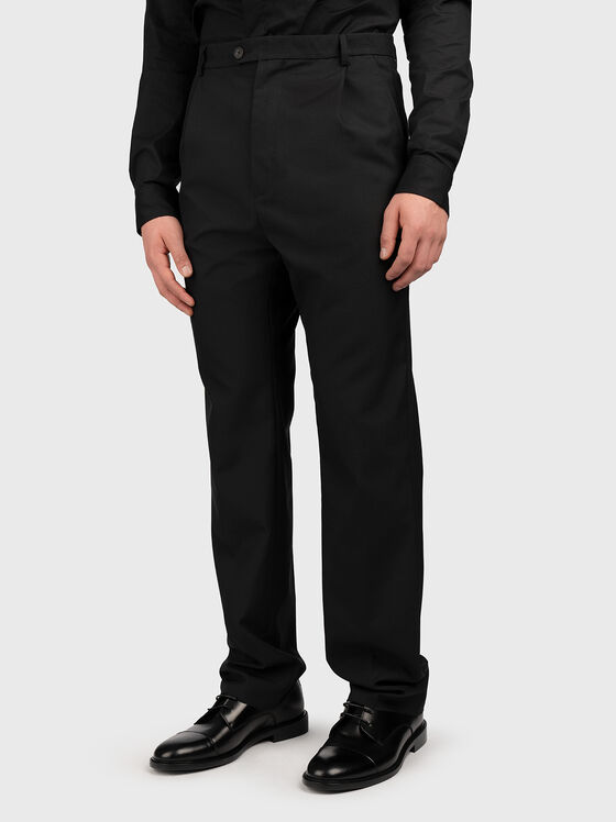 Straight cut trousers in black colour - 1
