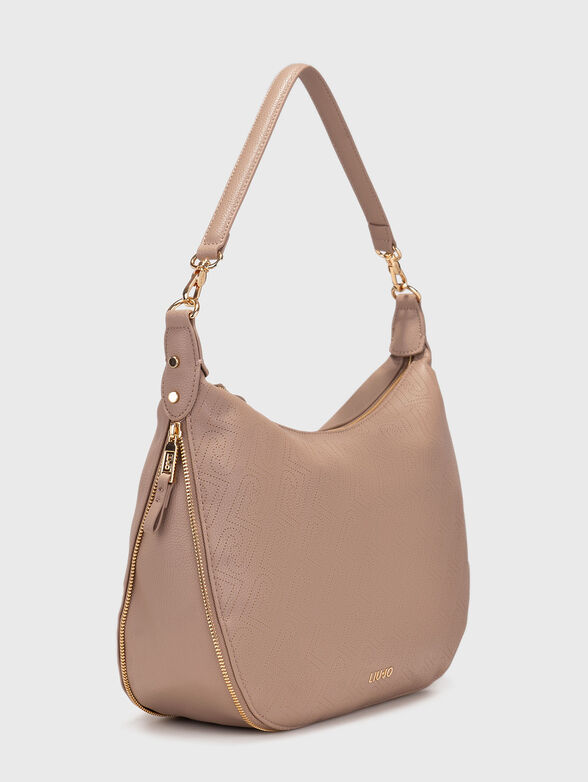 Crossbody bag with perforations  - 4