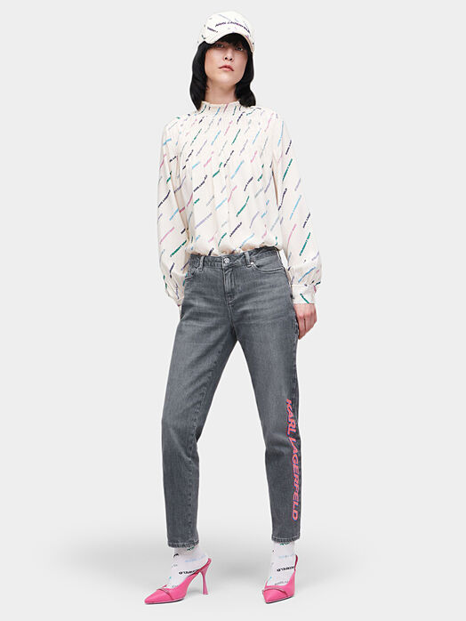 Grey jeans with contrasting logo detail