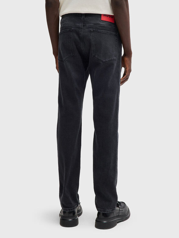 Jeans with washed effect and logo - 2