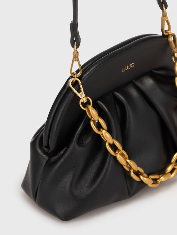 Black handbag with golden details - 4