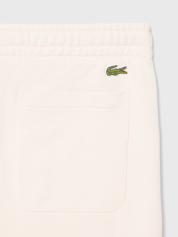 Cotton shorts with logo print in ecru - 4