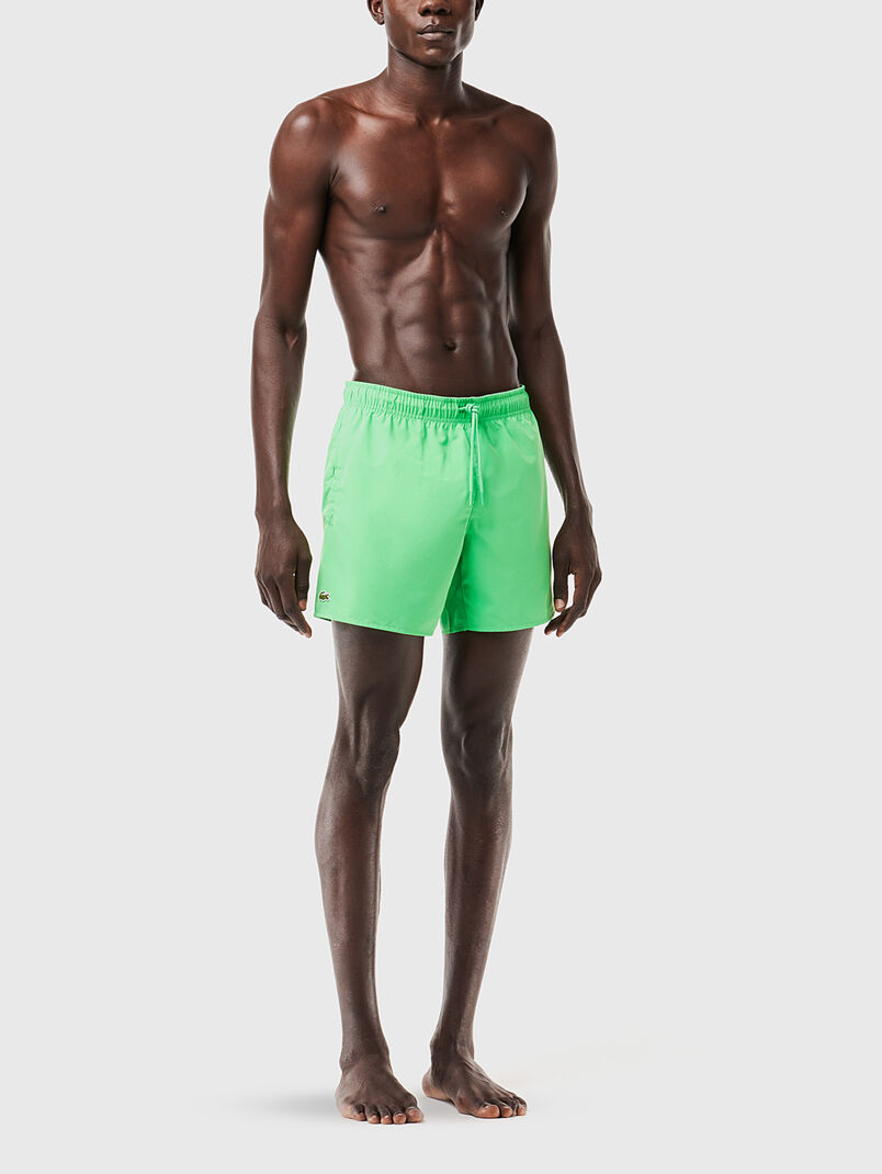 Yellow shorts with logo detail - 3