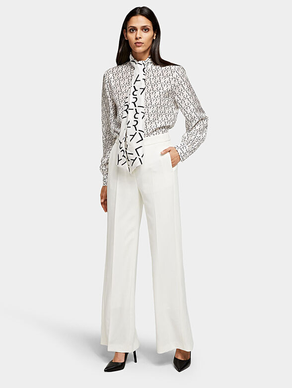 Trousers with back slit hem - 1