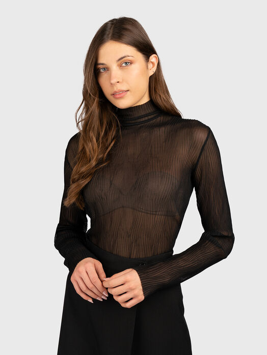 Blouse with sheer effect
