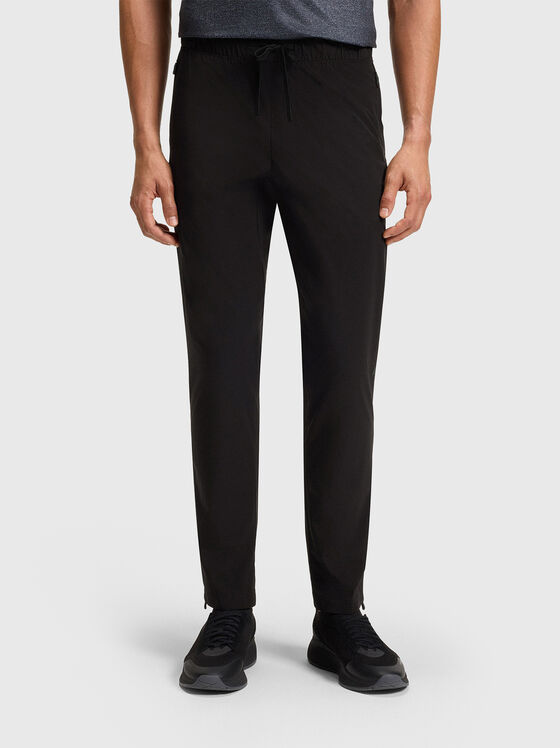 Sport trousers with an accent zip and logo - 1
