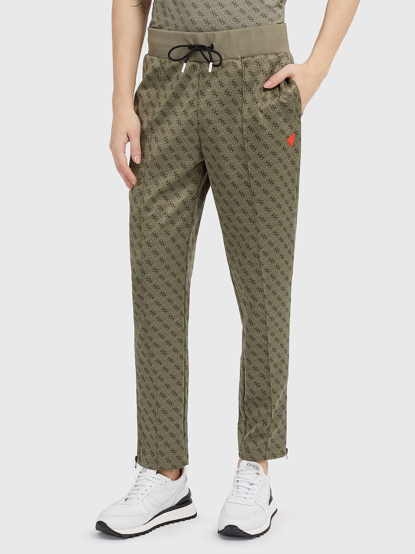 Monogram logo print sweatpants in beige brand GUESS Globalbrandsstore en