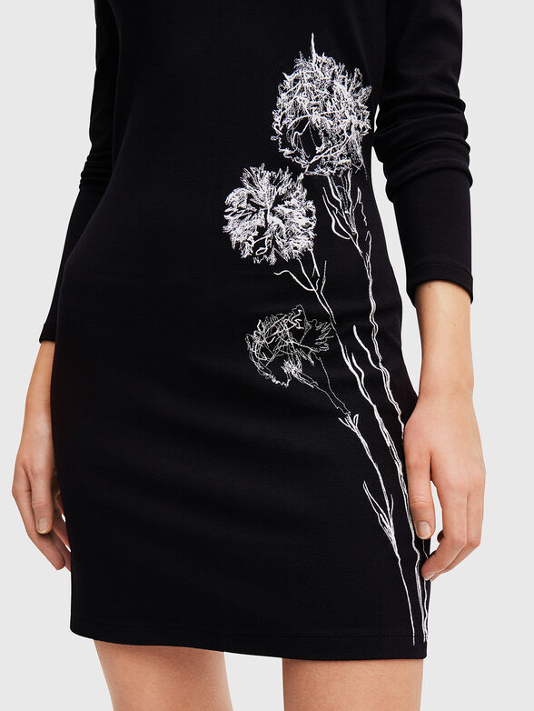 Black dress with floral accent - 3