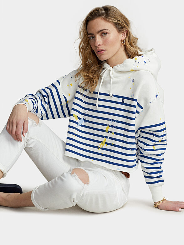 Cropped sweatshirt with hood and art accents - 1