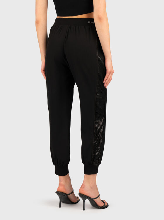 Sports trousers with sequins and logo - 2