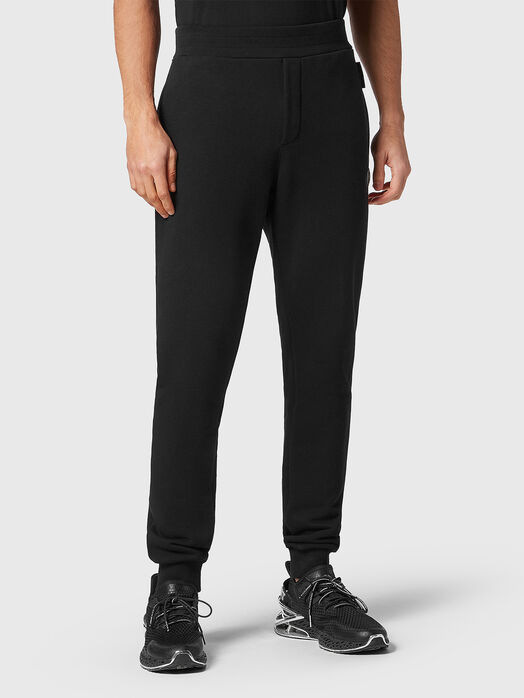 Black sports trousers with logo patches 