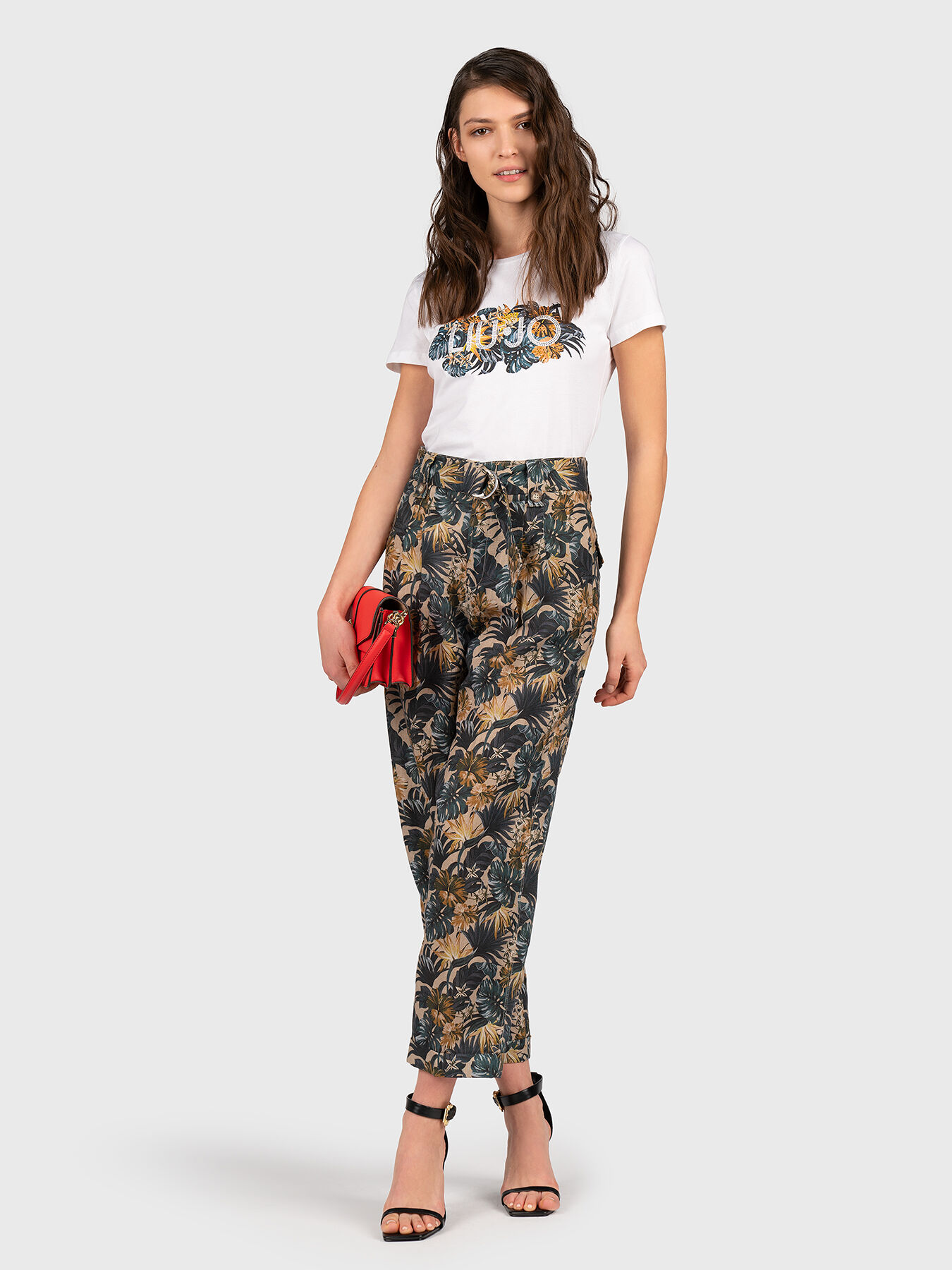 Pants with floral print brand LIU JO — Globalbrandsstore.com/en