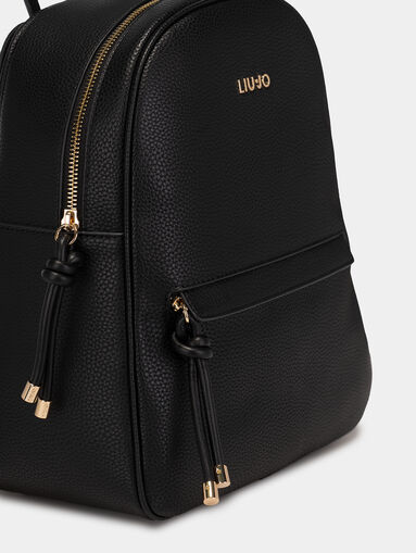 Backpack with metal logo accent - 5