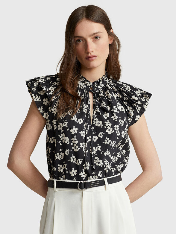 Blouse with accent sleeves and contrasting print - 1