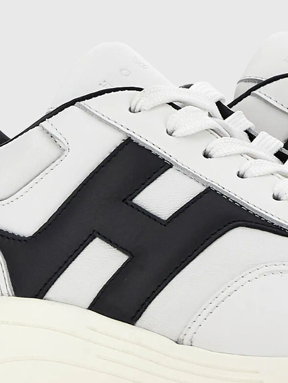 Leather sneakers with a contrasting logo - 5