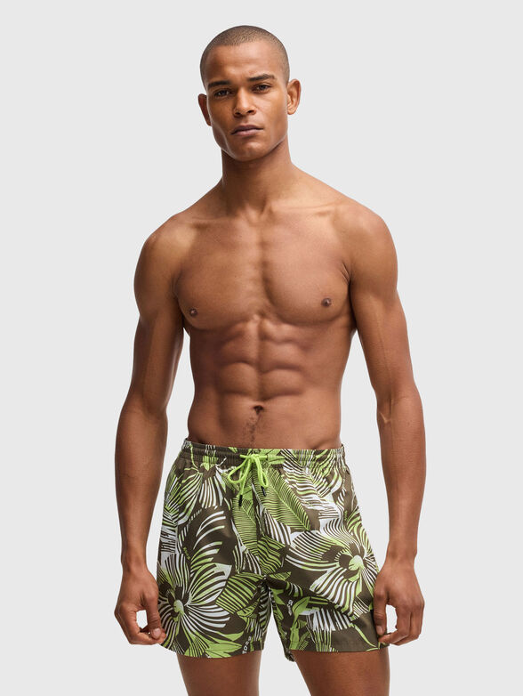 Beach shorts with floral motifs - 1