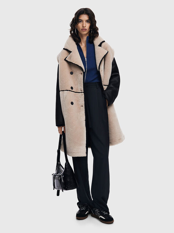 Coat with detachable sleeves - 1