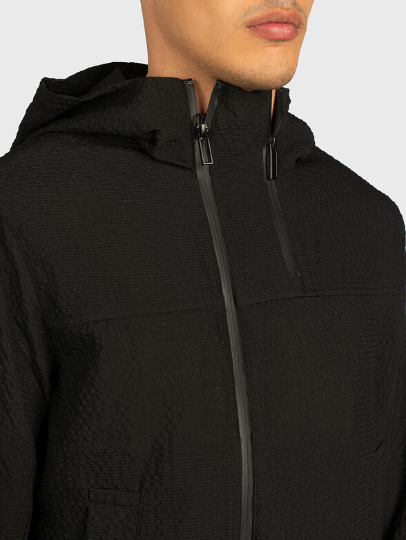 Jacket with an asymmetrical fastening - 2