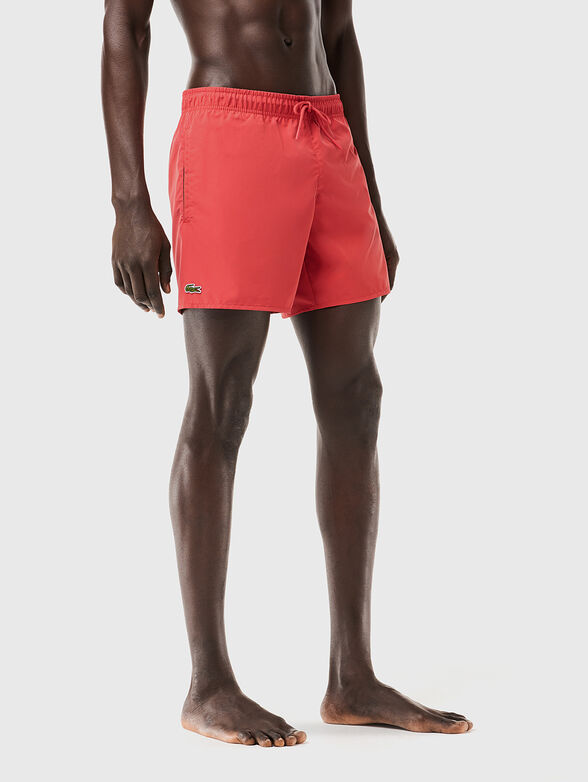 Yellow shorts with logo detail - 1