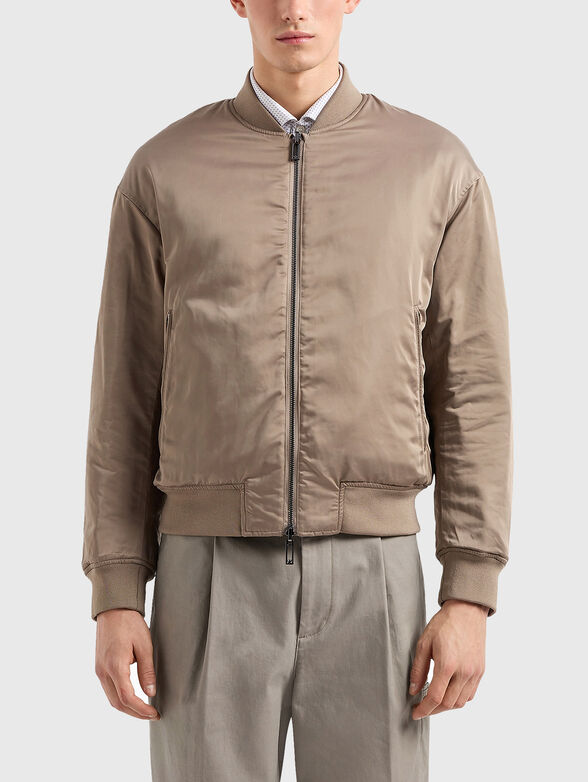 Reversible bomber jacket in beige - 1