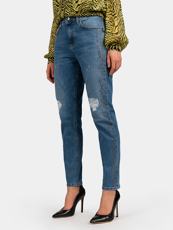 Blue jeans with applied rhinestones - 1